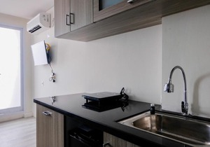 Comfy and Tranquil Studio Room Bintaro Icon Apartment By Travelio