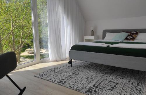 Zarnowica Apartment | Źródlana Apartamenty - całoroczne domy na wyłączność