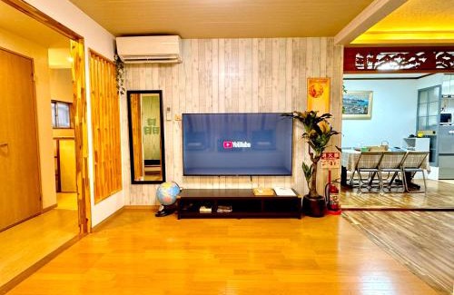 Nishinari House | 晶 距离车站步行5分钟 关西机场难波心斋桥直达 5 bedroom最多可住13人 超大客厅大电视有Netflix