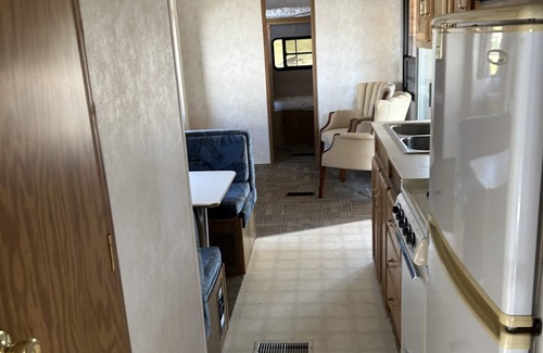 Stokes Bay RV Rental | #0 Enjoy a waterfront view from your own trailer with a deck & sunroom