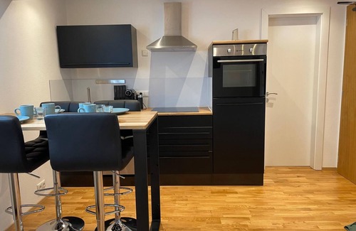 Flintsbach A. Inn Apartment | 1,5 rooms, top equipped, 4 pers, basement, parking lot, self check-in