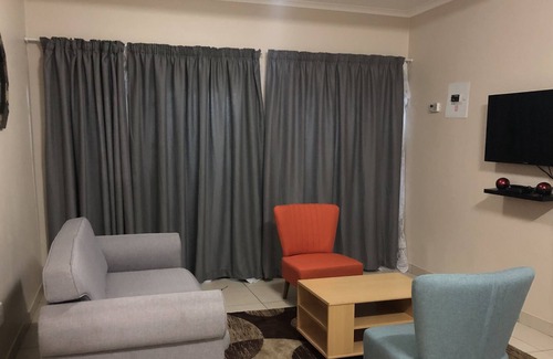 Manzini Apartment | 1 bedroom apartment, sleeps 4, 1 queen bed and double sleeper couch, bathtub