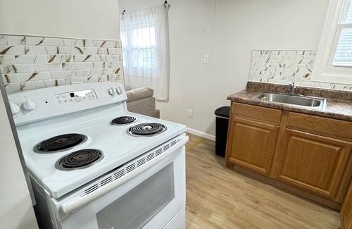Newark Apartment | 1 Bedroom Urban Retreat with Patio & Gym!