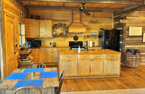 Arkadelphia House | 1850 log cabin with 2 br, 2 baths, W/D, mini split A/C, carport attached