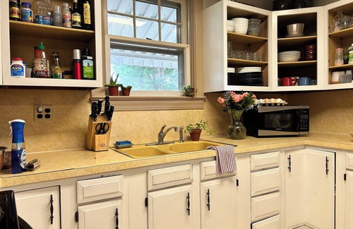 Clarksville House | 1920s farmhouse with a water view, and 6 miles to downtown Clarksville.
