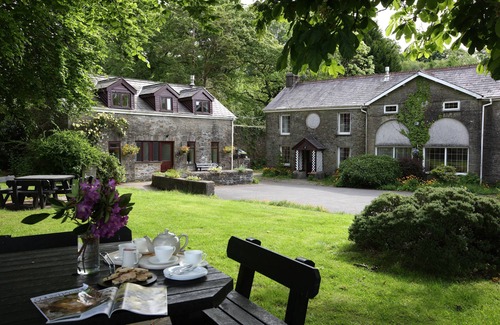 Margam Cottage | 19th century stable with four poster, river views and free WiFi