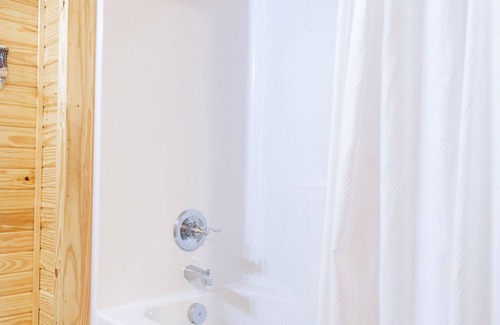 Ramer House | 1bd rm, 1 bth, hotel style cabin w/Mini fridge, micro, & tv, at Kick Back Ranch