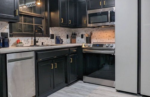 Brookline Station Apartment | 1BR/1BA Walk-Out Basement W/Hot Tub Pet Friendly