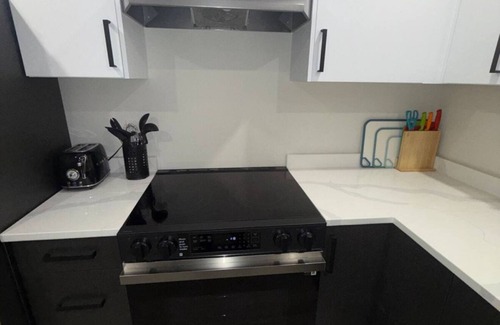 Grande Prairie Condo | 2 Bed 1 Bath pet friendly duplex in amazing location 2 min walk to school/park