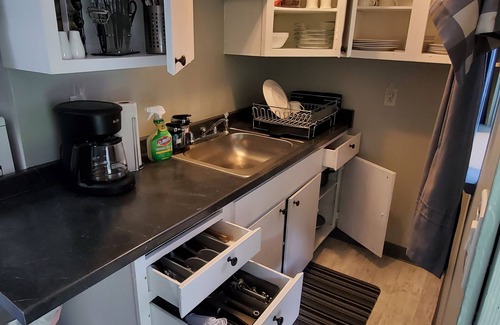 Aloha House | 2 bedroom/1 bath entire house across from the food trucks of the Aloha mall!