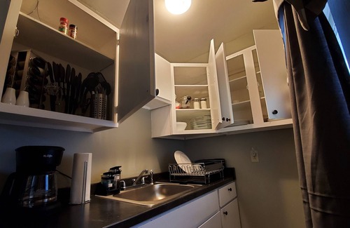 Aloha House | 2 bedroom/1 bath entire house across from the food trucks of the Aloha mall!