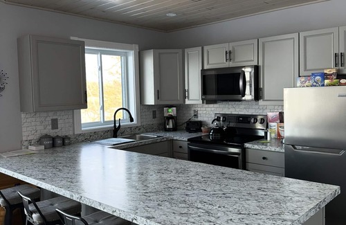 St Lawrence County Apartment | 2-bedroom apt. Riverfront w ACWiFi and STUNNING views of the St Lawrence River
