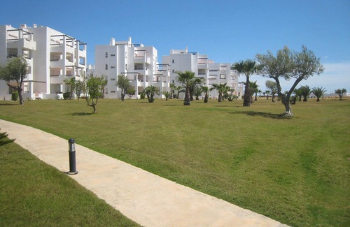 Roldan Apartment | 2 Bedroom (sleeps 4/5) ground-floor apartment backing onto grass area & pool