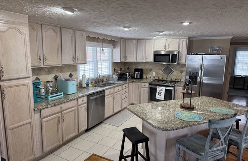 Gilbert House | 2 Family Lakefront Home on Big Water in Gilbert - Families & Pets Welcome