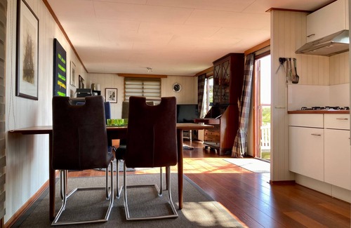 Anjum House | 2 pers - house König lakeside of the Lauwersmeer with own fishing pier Sauna
