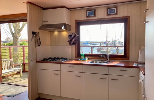 Anjum House | 2 pers - house König lakeside of the Lauwersmeer with own fishing pier Sauna