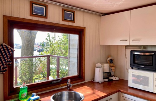Anjum House | 2 pers - house König lakeside of the Lauwersmeer with own fishing pier Sauna
