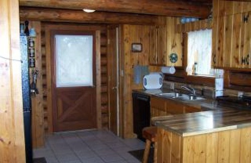 Condon House | 2 Story Log Home, on a Swan River near Mission Mountain Wilderness Views
