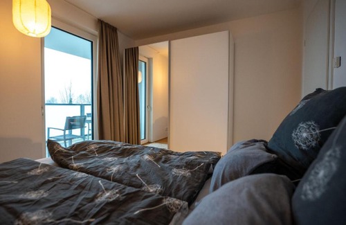 Innenhafen Apartment | 210 Fewo Langeoog mit Balkon und Meerblick sowie Seeblick