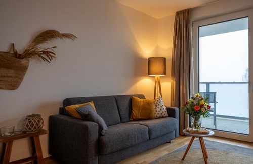 Innenhafen Apartment | 210 Fewo Langeoog mit Balkon und Meerblick sowie Seeblick