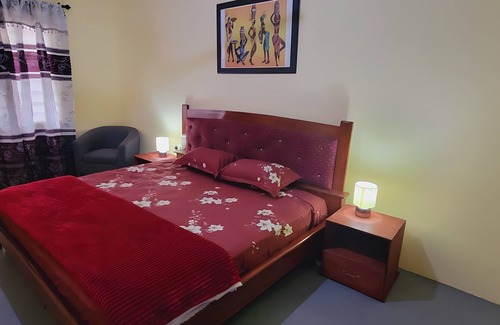 Winneba House | 25 minutes to Winneba Beach! A quiet family suite with dining and living area.