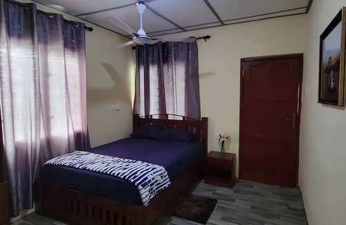 Winneba House | 25 minutes to Winneba Beach! A quiet family suite with dining and living area.