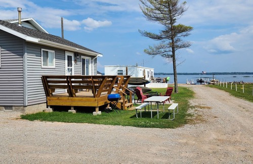 Gladstone Cottage | 2bed 1bath LAKE MI Fishing Cabin WiFi AC Deck Firepit Kayak Paddle Boat Dock #9