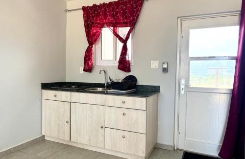Seru Mahuma Apartment | 2BR Top Hill Island view and distant ocean view