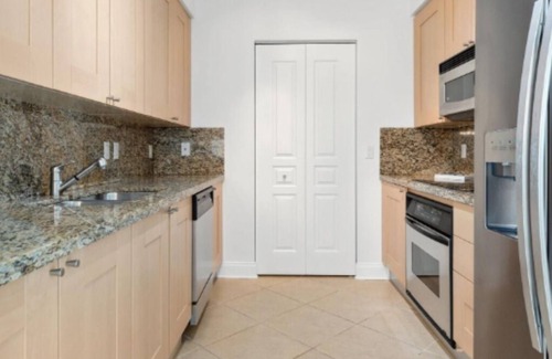 Riverwalk Fort Lauderdale Condo | 3-bedroom condo in marvelous Fort Lauderdale with WiFi, AC, fitness room