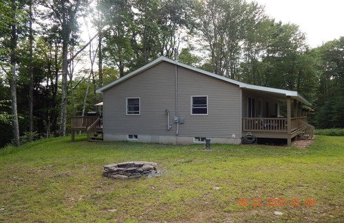 Delancey House | 3 Bedroom home with rear deck and covered front porch.
