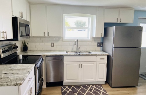 Englewood South House | 3 miles to beach, hot tub & fenced yard for pup