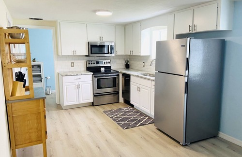 Englewood South House | 3 miles to beach, hot tub & fenced yard for pup