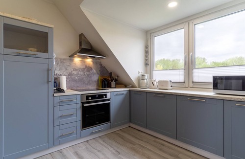 Tating Apartment | 3-room apartment on the 1st floor of a detached house with infrared cabin and balcony.