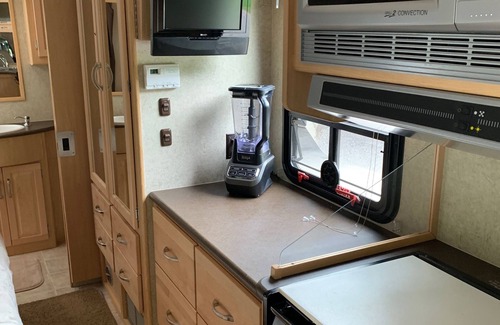 Cedar House | 30' motorhome on private setting.