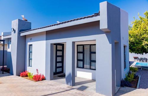 North-West District Apartment | 3bd home with Starlink WiFi , pool, near CBD & Airport
