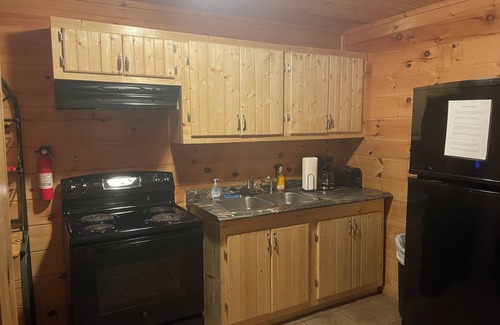 Lejunior Cabin | 3BR, 1 Bath Cabin with hot tub, full kitchen, and living room.