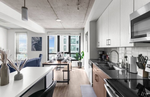 Five Points South Apartment | 3BR Oasis with Skyline Views 12th Floor