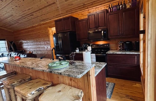 Wolf Creek Cabin | 4 bed 3 bath cabin at Holter Lake by Wolf Creek Craig. Fishing, pool table, fun!