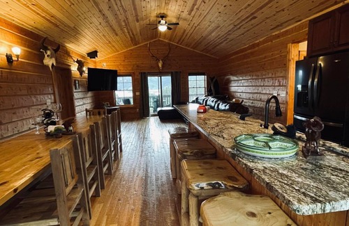 Wolf Creek Cabin | 4 bed 3 bath cabin at Holter Lake by Wolf Creek Craig. Fishing, pool table, fun!