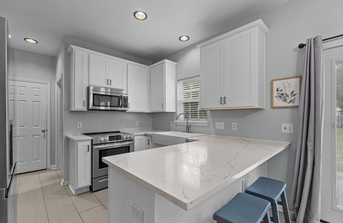 Holly Springs House | 4 bedroom, 2 1/2 bathroom single family home with garage and fenced in yard!
