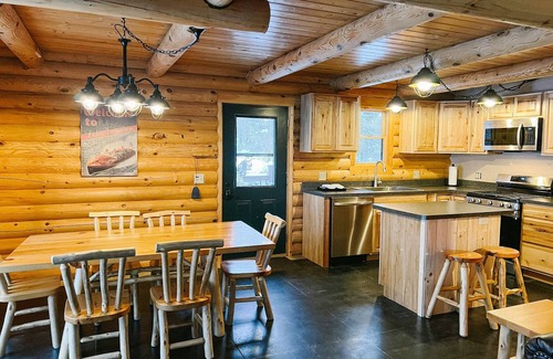 Cook Cabin | 4 bedroom 3 bath Log Cabin with Sand Beach, water toys, sauna, yoga, game room
