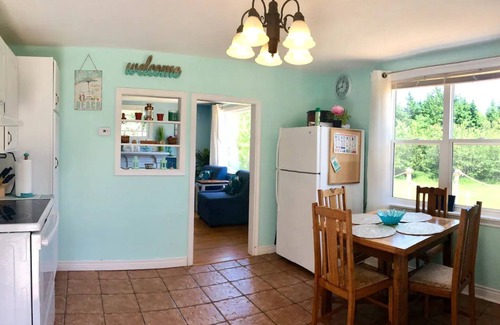Savage Harbour Cottage | 4 bedroom cozy beach house. Large private yard, short walk to the beach!