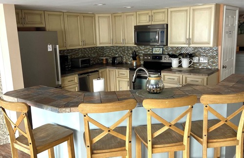 Conesus House | 4 season escape boasts 5 beds and now a HOT TUB to enjoy any time of year!