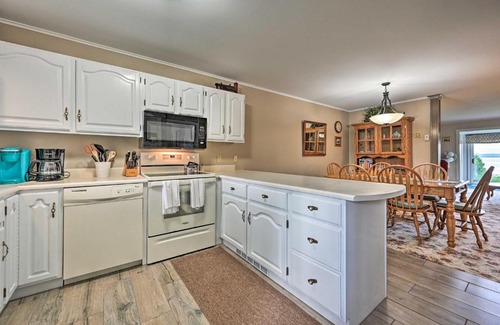 Newport Center Apartment | 4-Season Lakefront Condo Swim, Boat and Ski!