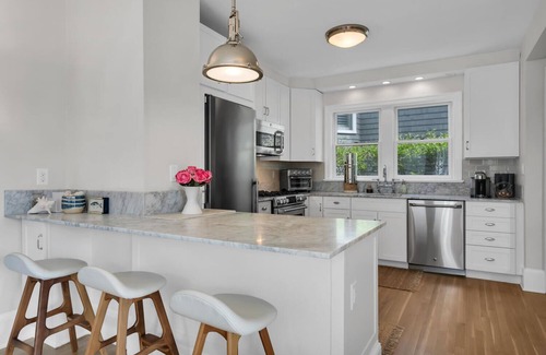 Rumson Cottage | 4BR Rumson Cottage with Back Porch Water Views, Steps to Beach & Town