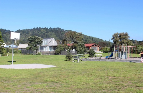 Matarangi House | 5 minutes walk to beautiful beach & shops, fully fenced section pet friendly.