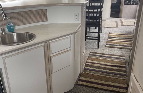 Anchor Bay Harbor Boat Rental | 50ft Stationary House Boat with Upper Sun Deck