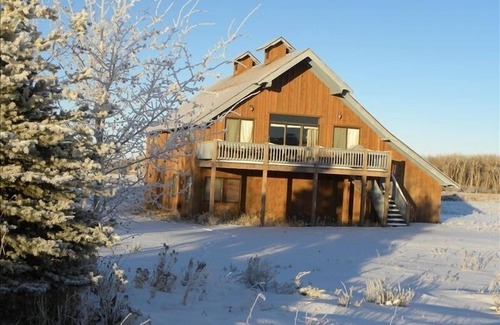 Clawson Apartment | 55% off monthly stays. Amazing Teton Views, Hot Tub, Office, Sauna, farmland