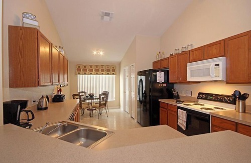 Eagle Pointe South House | 606 Peaceful Lake View family vacation home, single story. Close to Disney