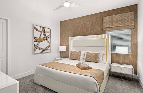 Florida Center Hotel | 9 Bedroom Home at Villatel Orlando Resort - Water Slides & Kids’ Playroom